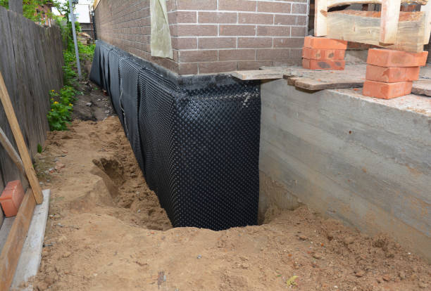 Happy homeowners after waterproofing job in Altoona